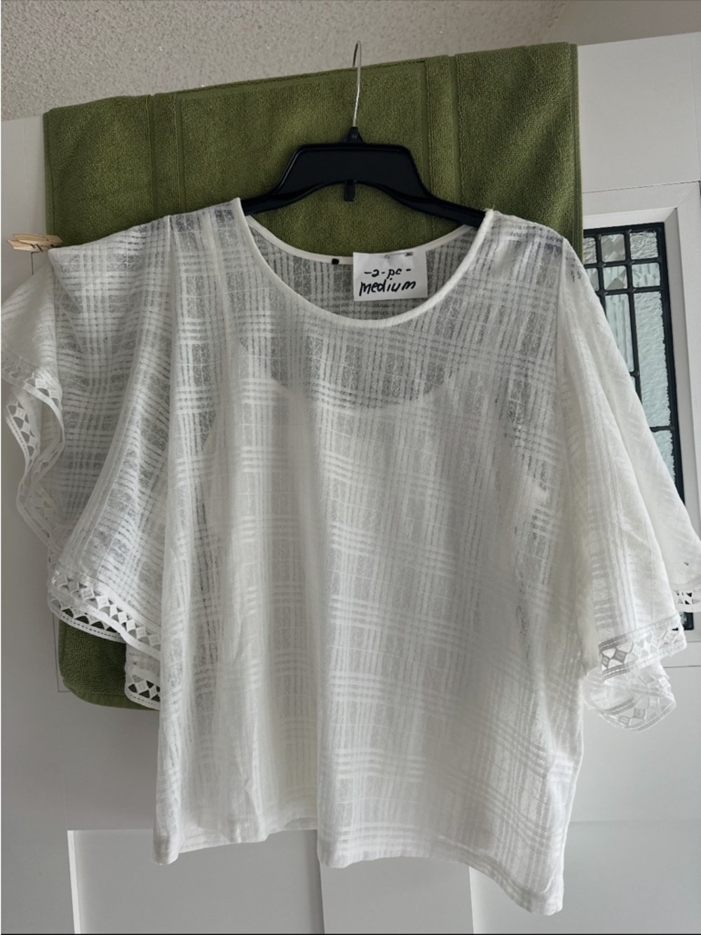 White Flutter Sleeve Blouse with Crochet Trim and silky tank top underneath